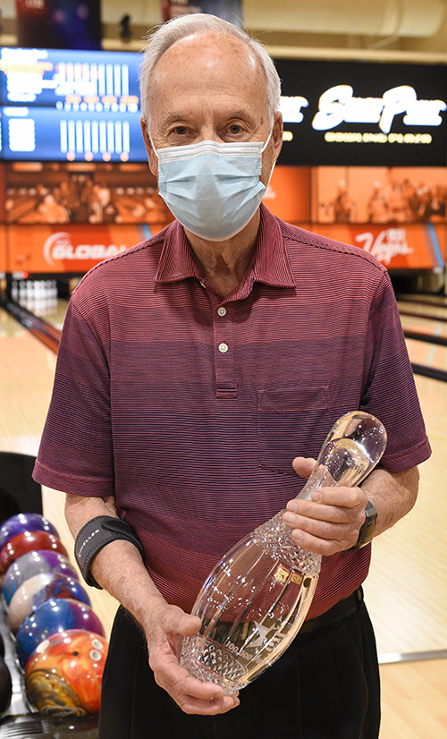 Jamie Brooks receives the crystal pin for reach 100,000 pins at the 2021 Open Championships